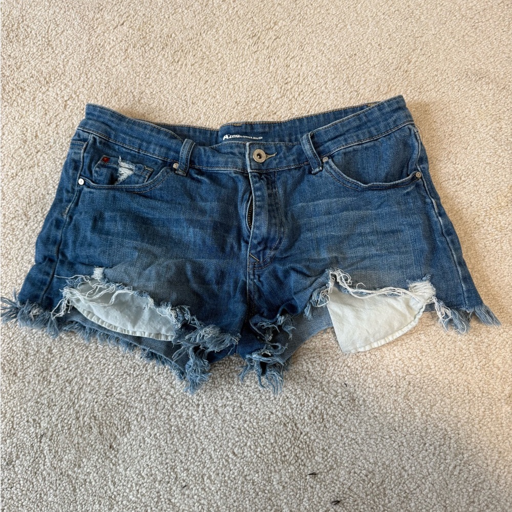 Classic Blue Distressed Jean Shorts with distressed stars on the back
